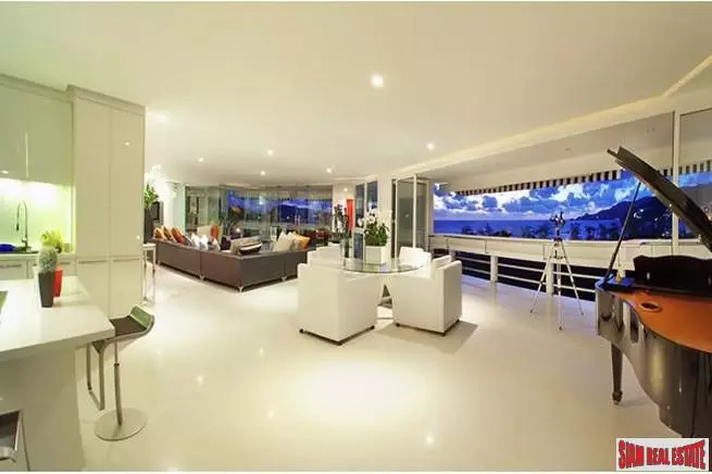 Andaman Beach Suites | Deluxe Modern Condo at World Famous Patong Beach, Phuket