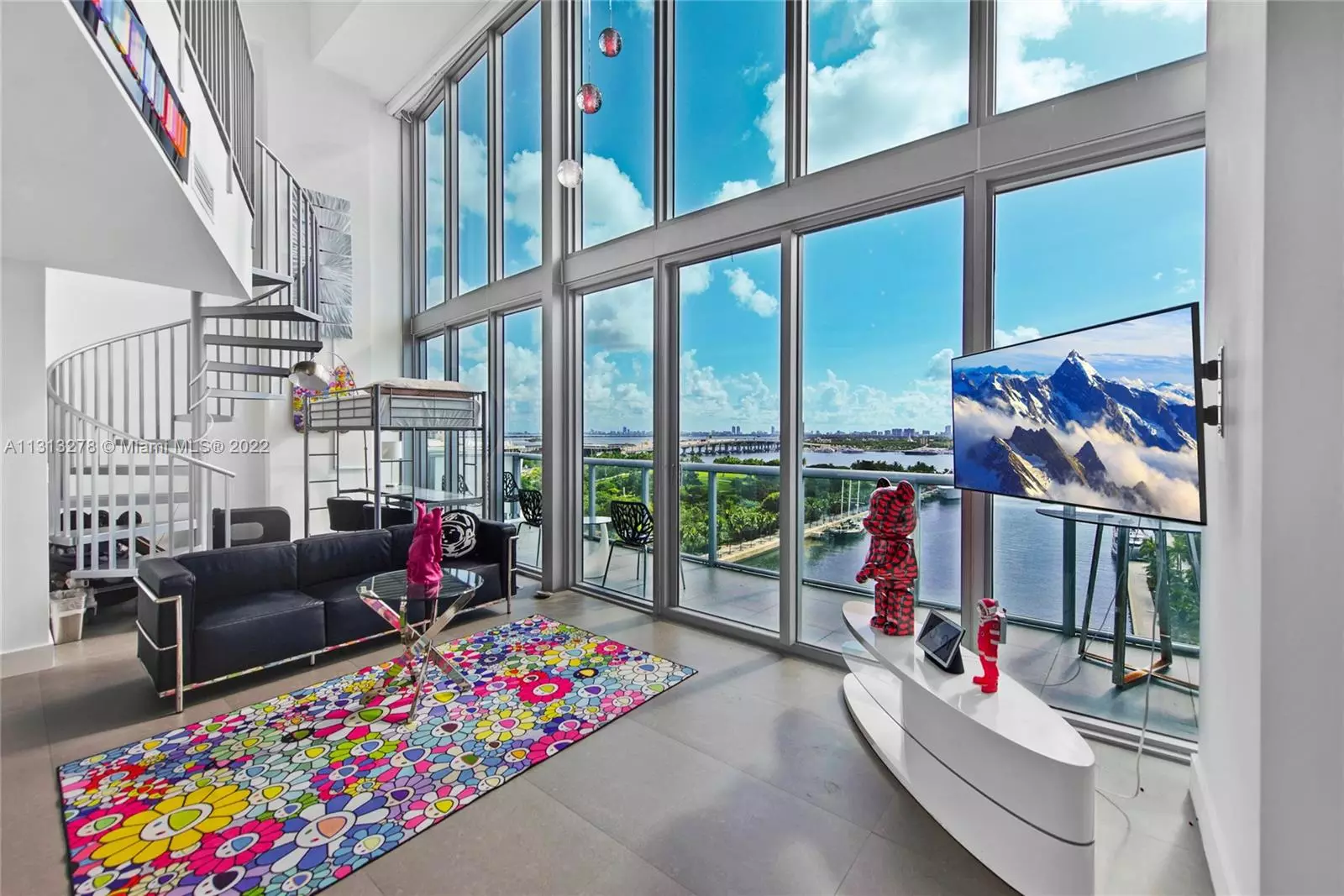 Spectacular Direct Water Views Throughout This 2-Level Residence In Marina Blue